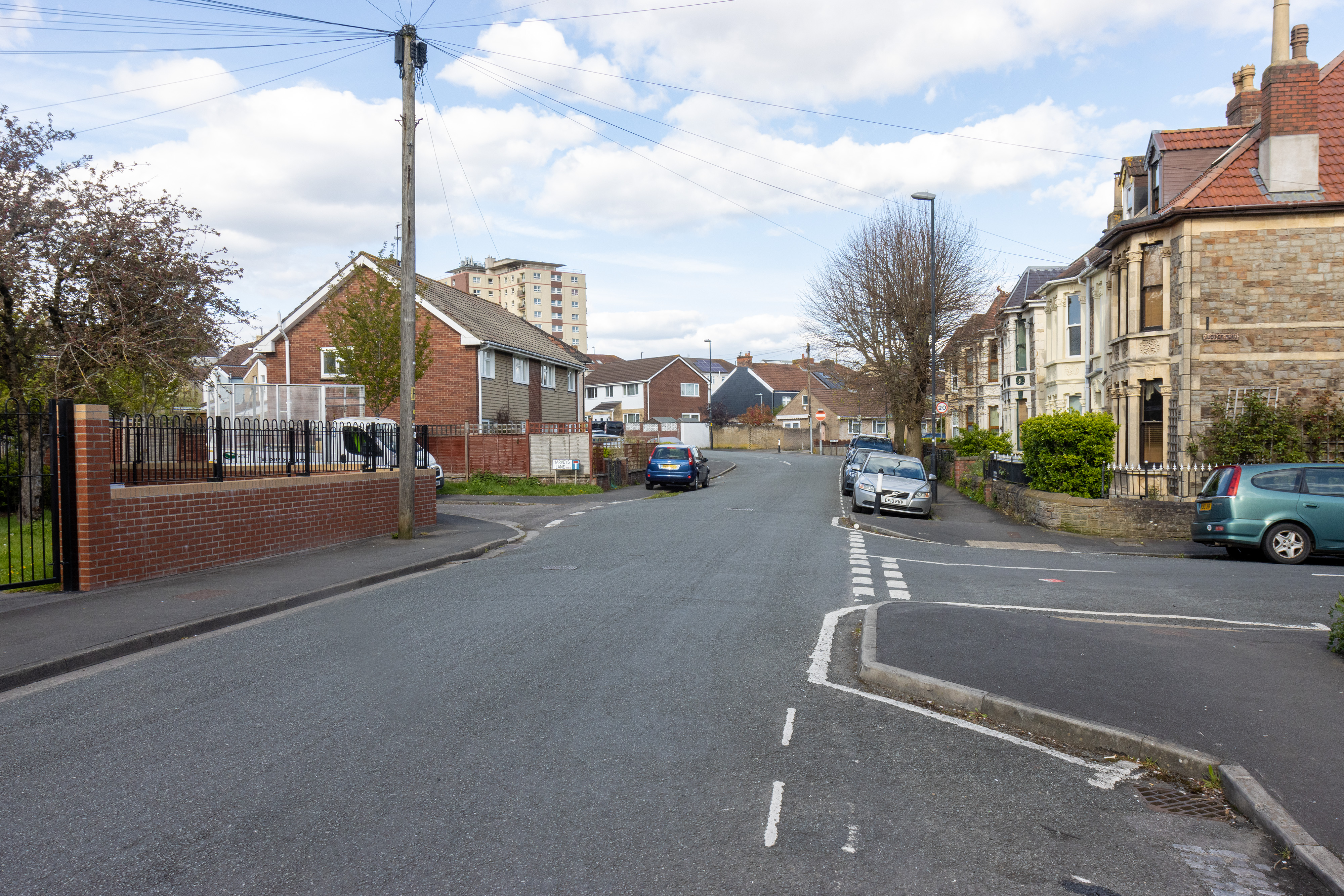 Car parked adjacent to the pavement.