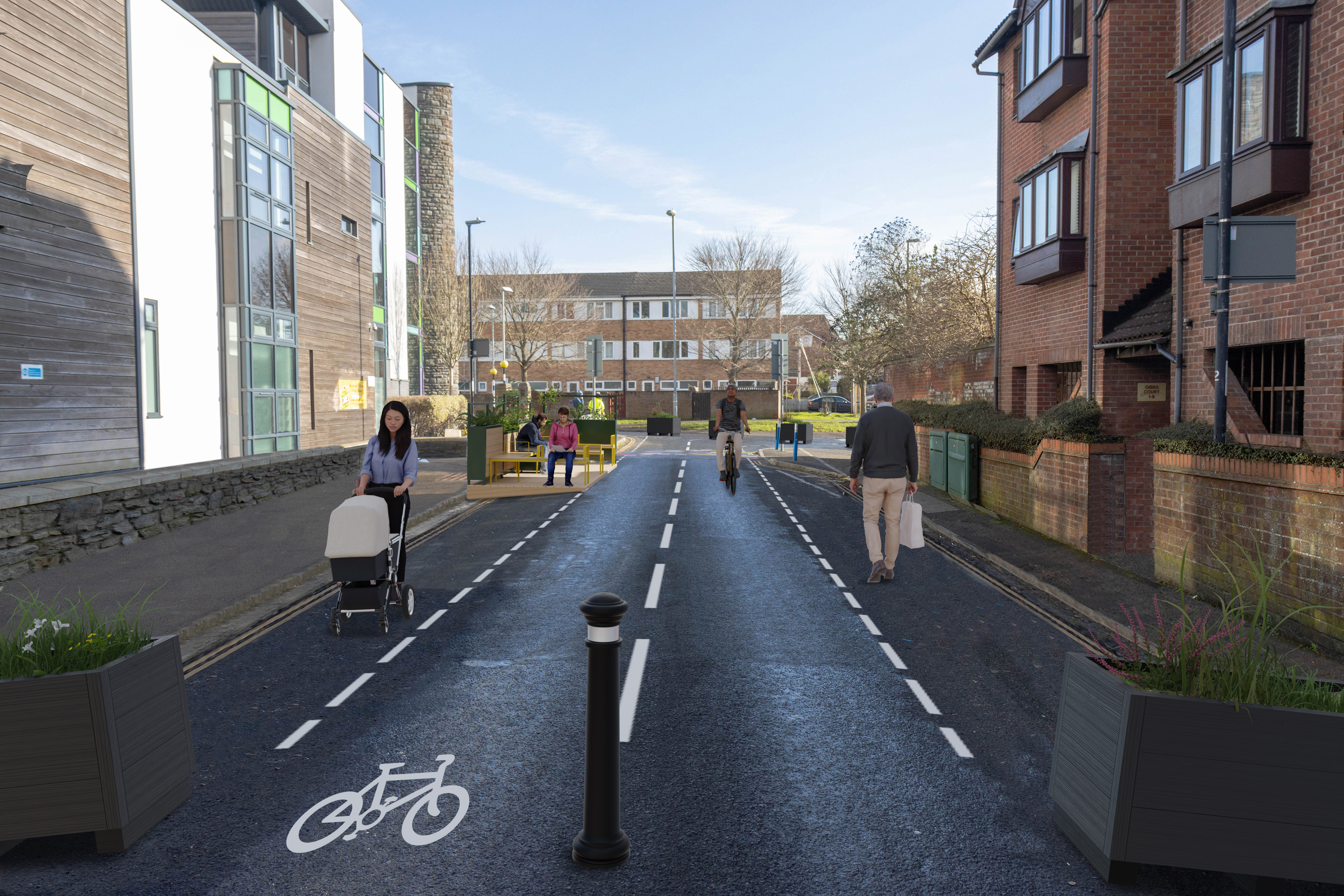 Planters and bollards at either end to stop traffic from entering the pedestrian area. Cycle symbols to show where cycles will access. Parklet on the school side of the street.