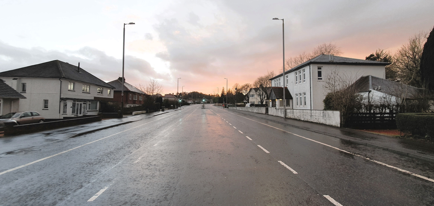 Photo showing current layout of Ayr Road. There are painted cycle lanes with no separation from the road.