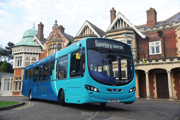 A picture of a public bus leaving Bletchley Park