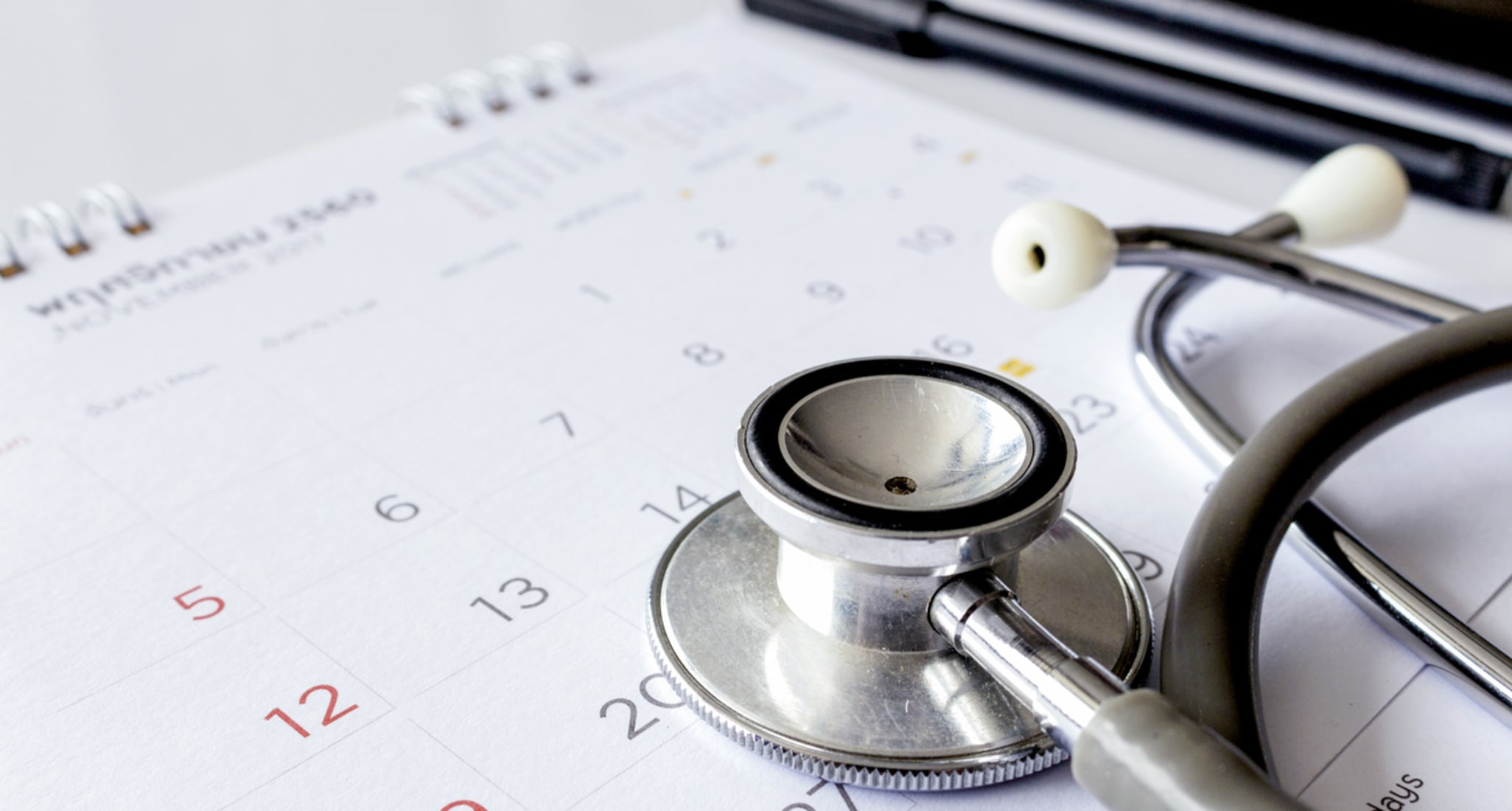 Waiting periods and qualifying periods: stethoscope on a calendar