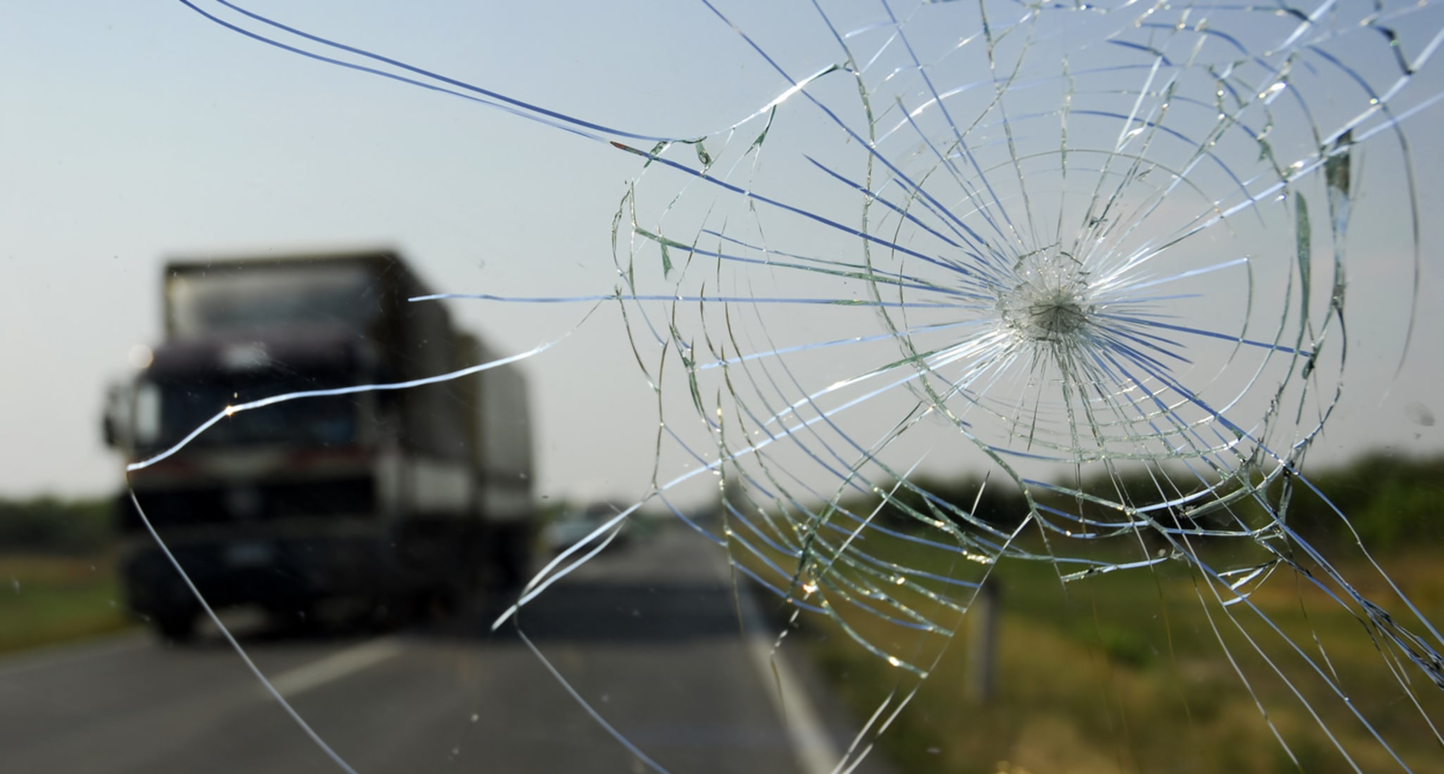 Stone damage to a car window on a highway in Switzerland.