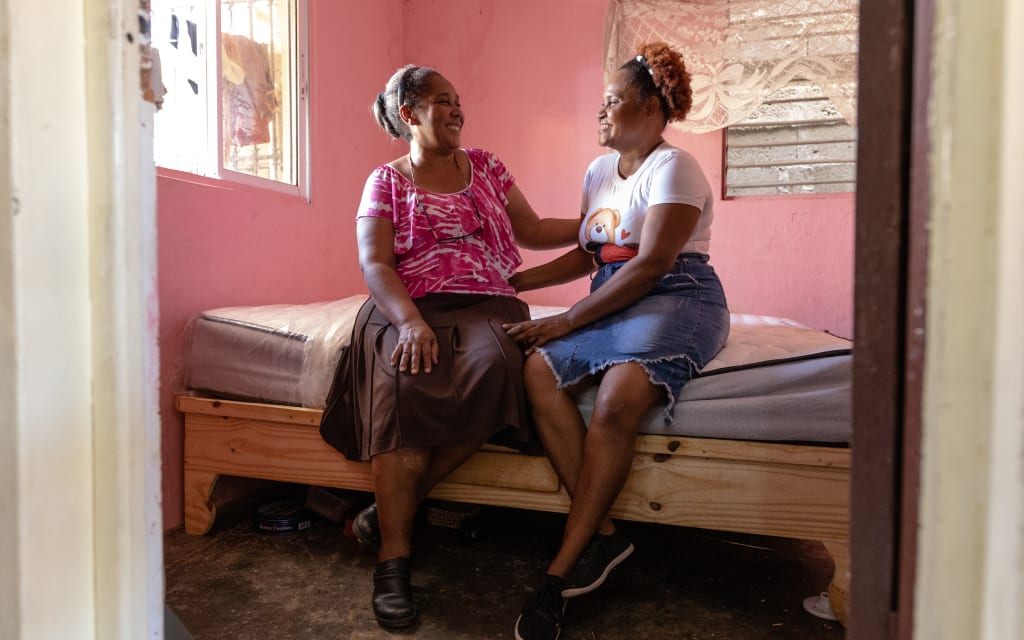 Yenny and Compassion staff member Rosina.