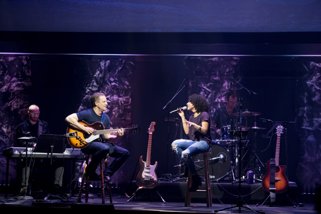 Chelsea and her husband Nathan performing together.