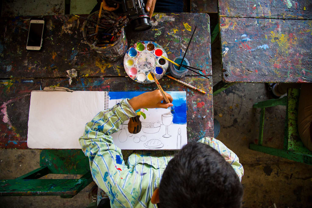 A child painting.