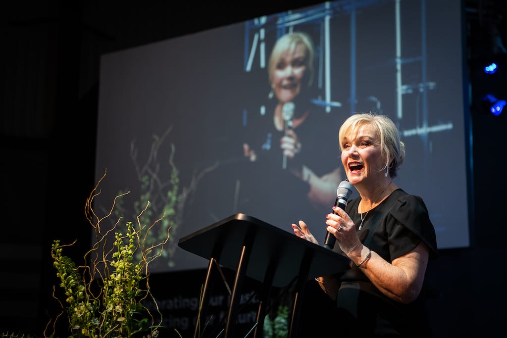 Sharon addresses the guests, sharing about the memories, challenges and joys of the past 36 years.