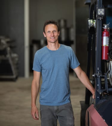 Winemaker and viticulturist Aaron Kendall in the Compris production space.