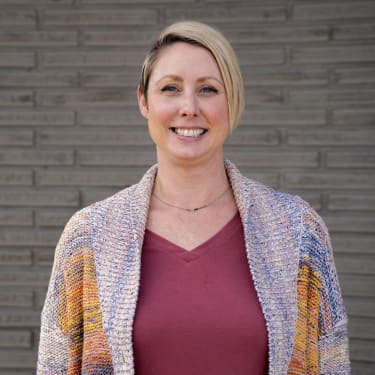 A portrait of Danielle Hernandez, Compris' newest team member.