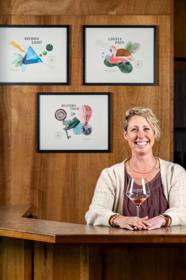 Friendly and knowledgable Compris team member Danielle Hernandez inside the tasting room.