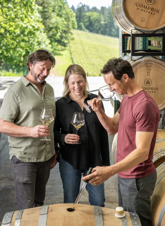Owners Dru Allen and Erin Allen, along with winemaker Aaron Kendall in our production space, where you will find filled with many diverse and unique varietals.