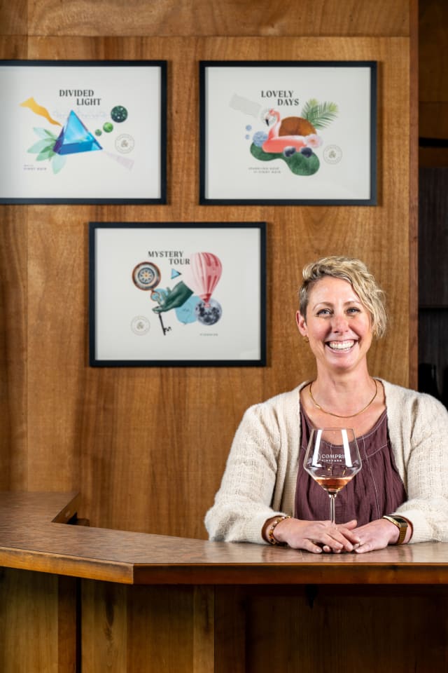 Friendly and knowledgable Compris team member Danielle Hernandez inside the tasting room.