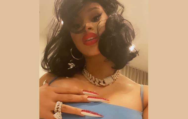 Cardi B flaunts artistic manicure design