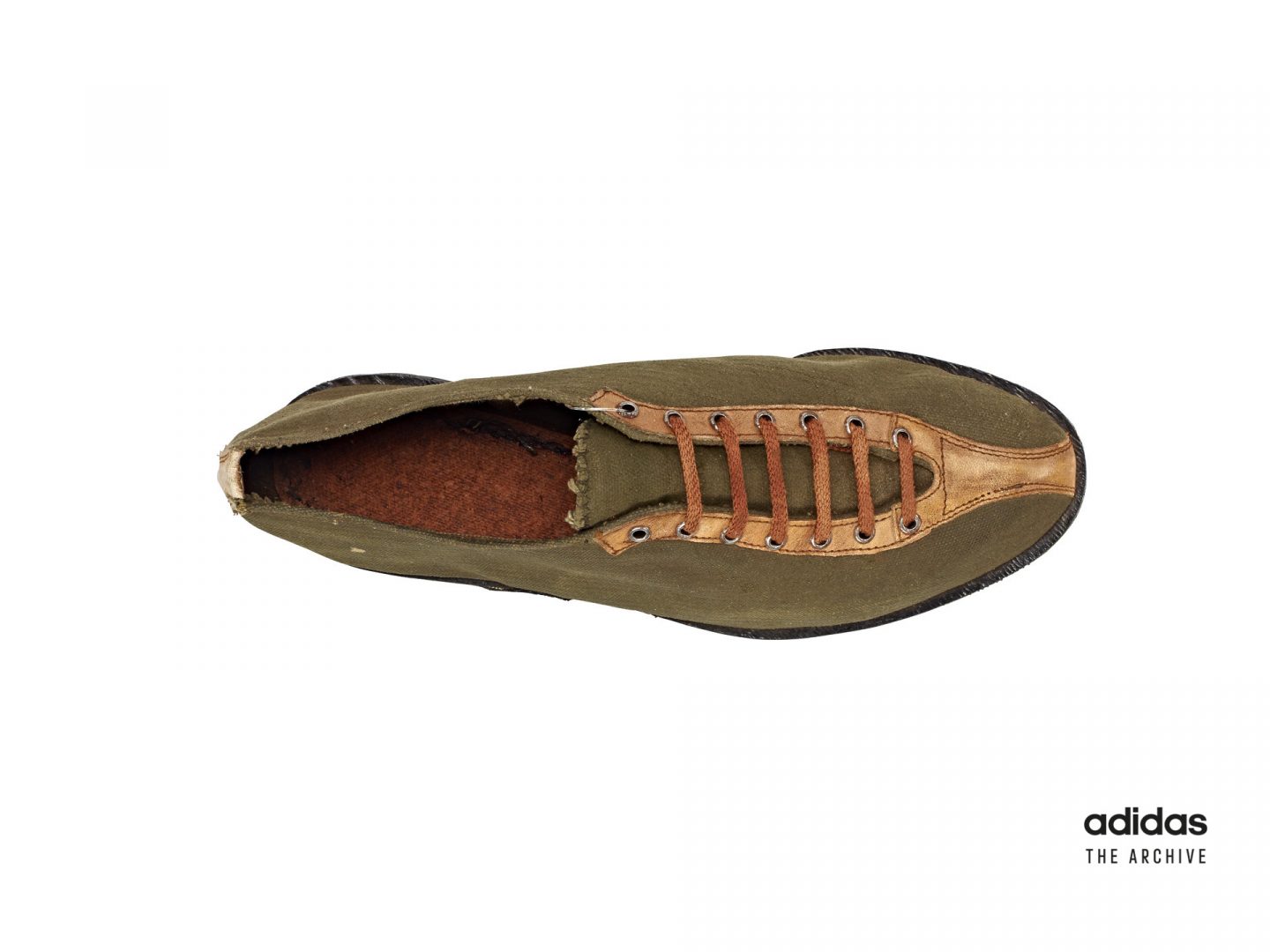 In the period immediately after the war supplies of traditional shoemaking materials like leather were in short supply in Germany. Adolf resorted to producing shoes from leftover war materials, such as this one made from tent canvas. ©Studio Waldeck Photographers