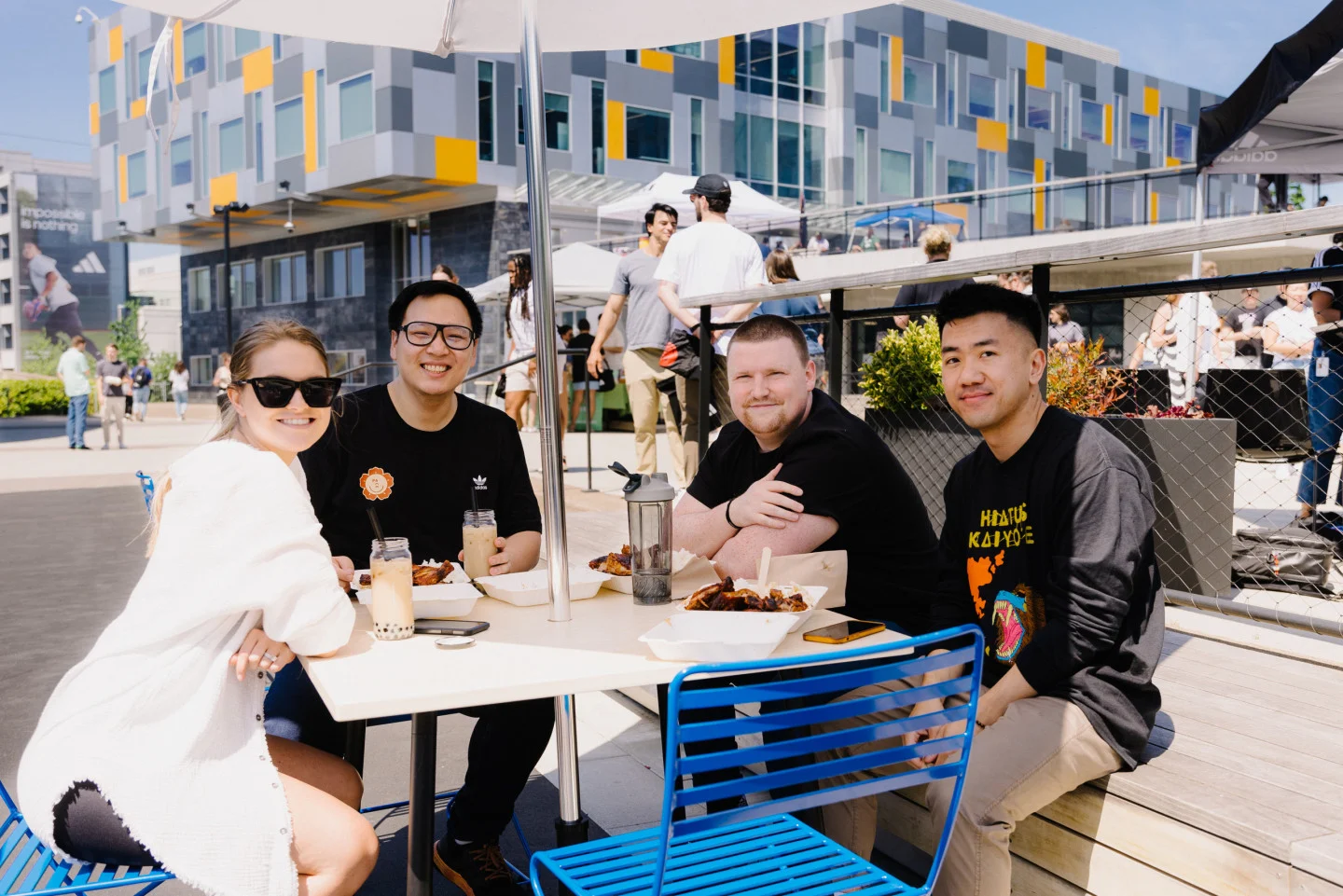 Employees enjoying Asian cuisine at the Daytime Night Market at adidas’ North America headquarters in Portland, Oregon.
