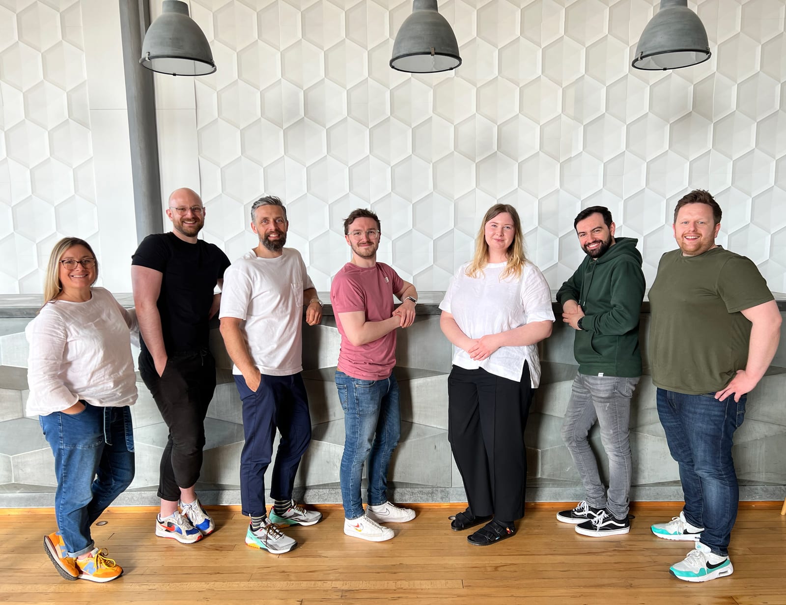 A photo of our lovely design team with new addition, Niamh Inglis. From left to right we have Jade, Ryan, James, Euan, Niamh, Liam and Paul.