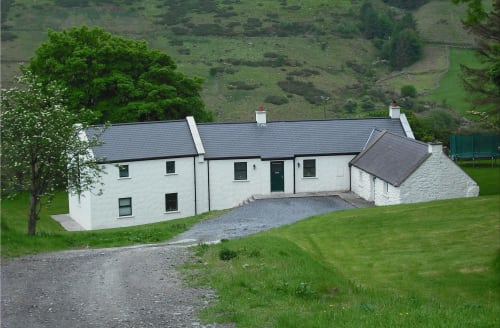 DWELLING IN GLENCULLEN Perched in the mountain landscape of Glencullen, this renovation transforms a traditional Irish farmhouse from the late 1800s. The original cottage represents the authentic mountain vernacular architecture that was common in this region during that period.
The split-level extension complements the existing structure through matching scale and form. The white rendered walls and grey slate roof maintain the building's original character while updating it for modern living. The design successfully bridges past and present, showing how rural architecture can be adapted for contemporary use while respecting its historical context.