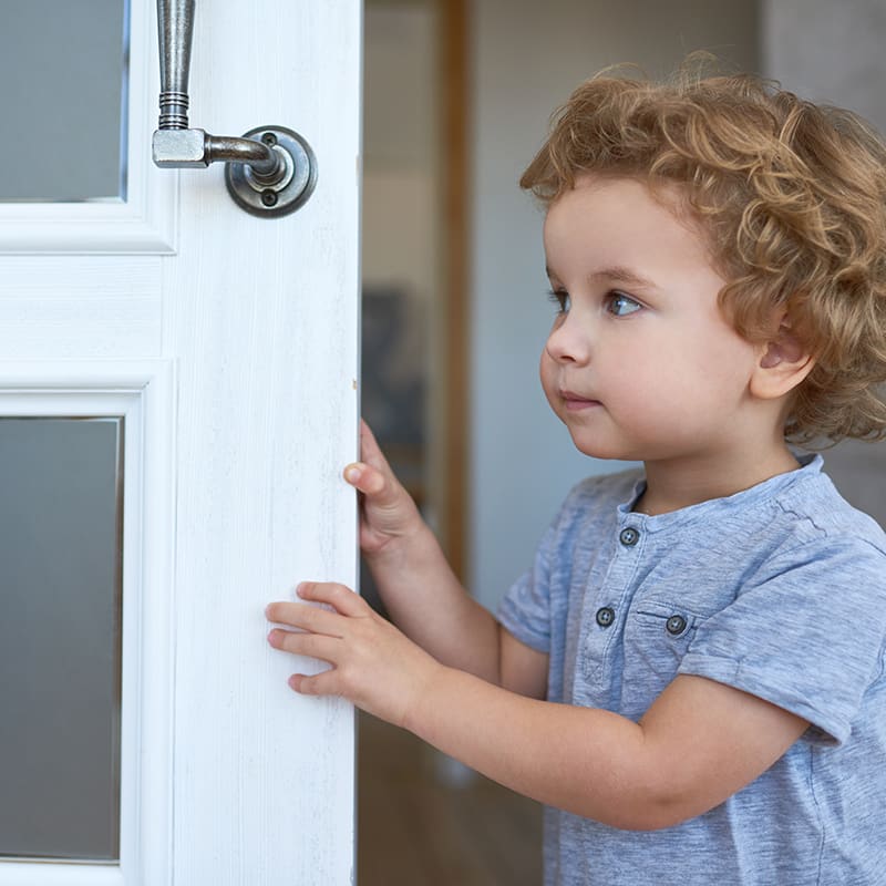 Toddler opening the door