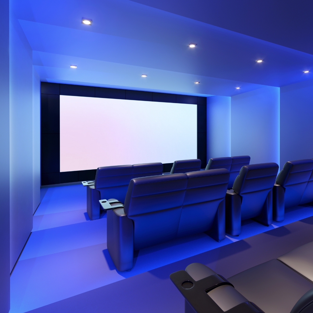 Prive home theater room with blue glow around the room