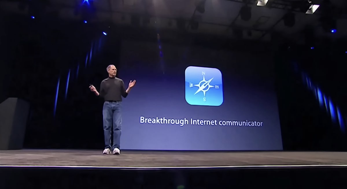 Steve Jobs on stage at the 2007 Macworld keynote beside a slide showing the Safari compass icon and the words &lsquo;Breakthrough Internet communicator&rsquo;.