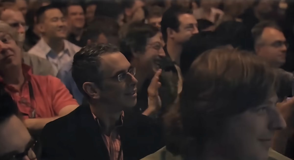 The Macworld audience laughing and smiling during the 2007 iPhone keynote.