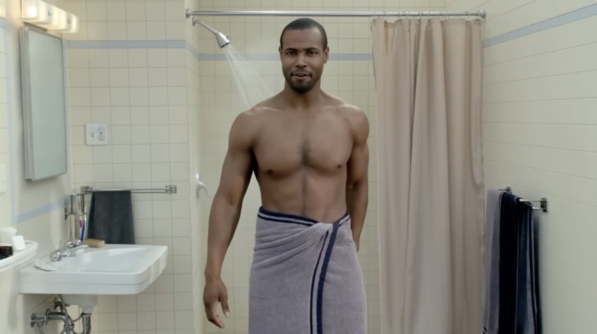 Isaiah Mustafa standing in a bathroom wrapped in a towel at the very start of the ad, the moment it opens with the words ’Hello, ladies.’