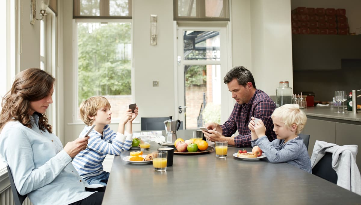 A family getting distracted.