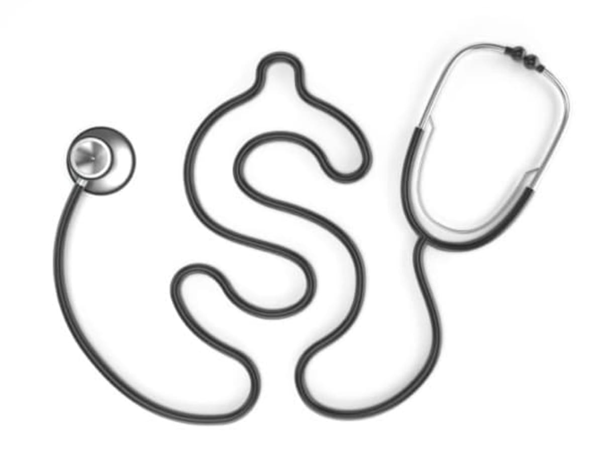 Picture of a stethoscope that’s cleverly shaped like a dollar.