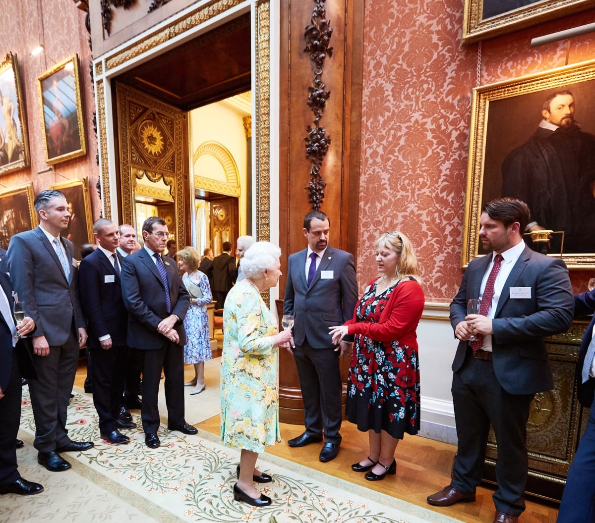 The Queen talking with the guests