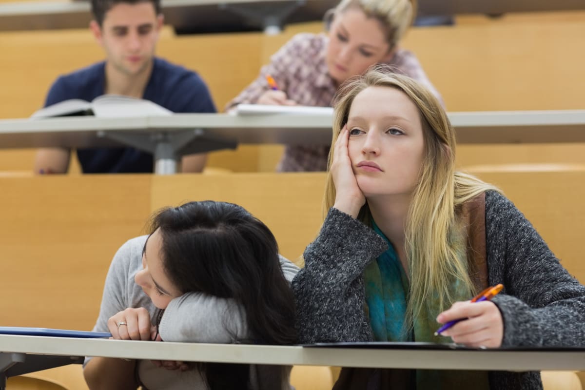 Two bored-looking students.