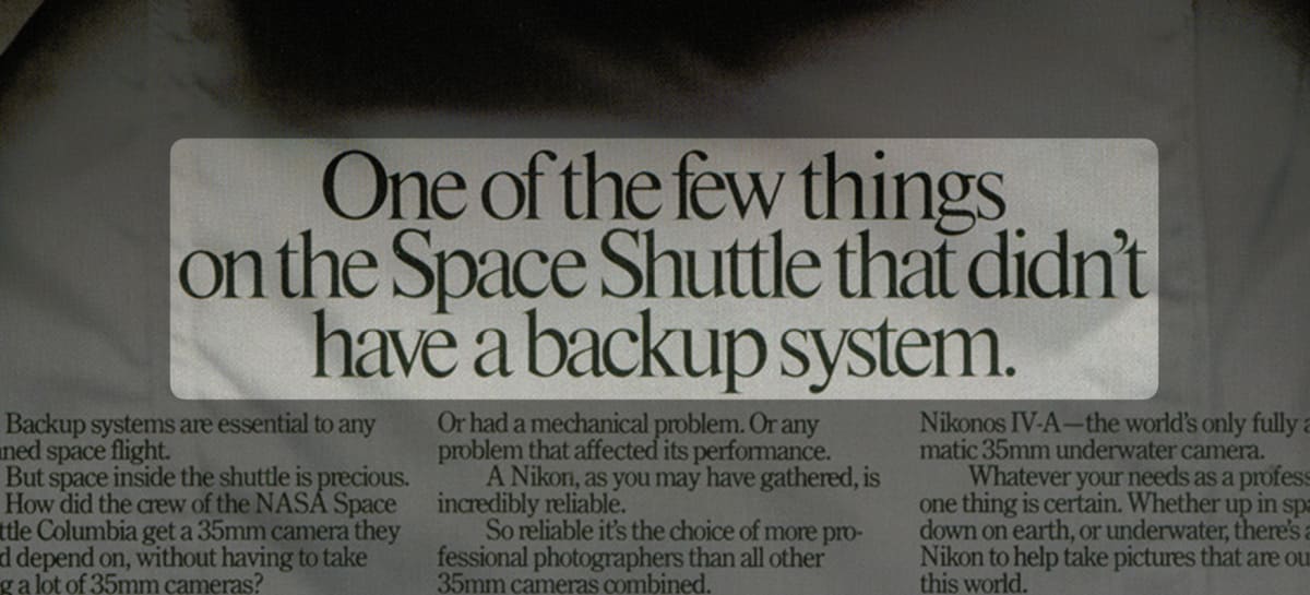 A screenshot of the 1981 ad from Nikon focussed on the headline which says “One of the few things on the Space Shuttle that didn’t have a backup system.”