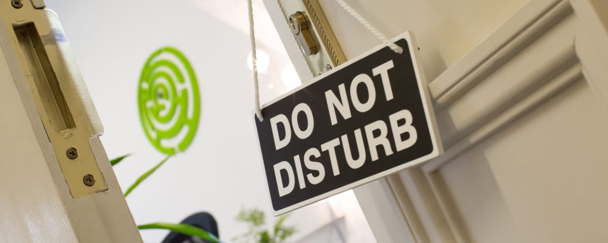 Photo of the “Do Not Disturb” sign in Conversion Rate Experts’ offices