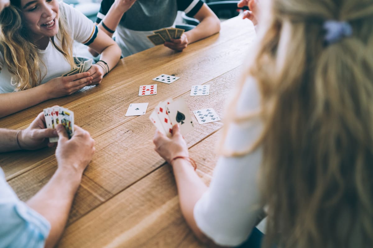 Family playing cards together