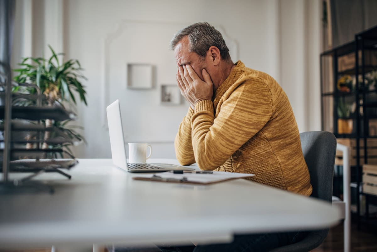 Man with head in hands after a ‘bad’ user test.