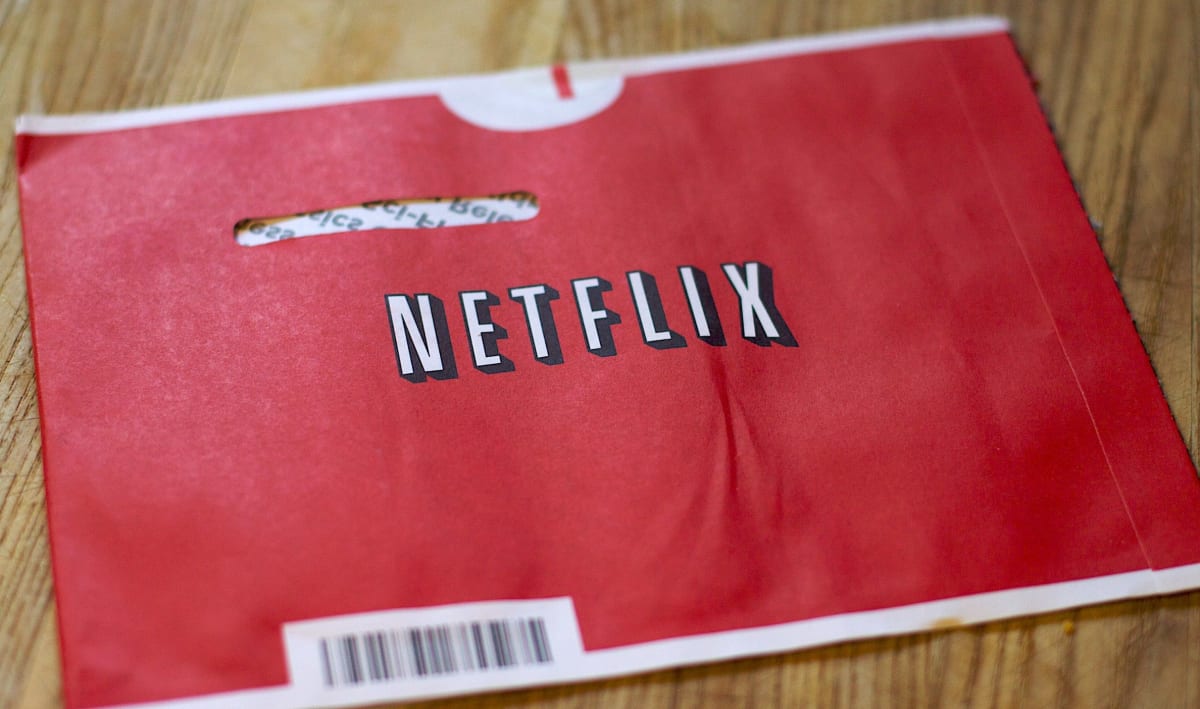 A red Netflix DVD envelope from the late 1990s.