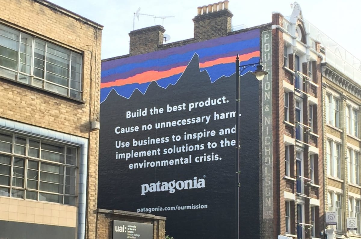 Patagonia’s mission statement—Build the best product—is painted on the side of a building.