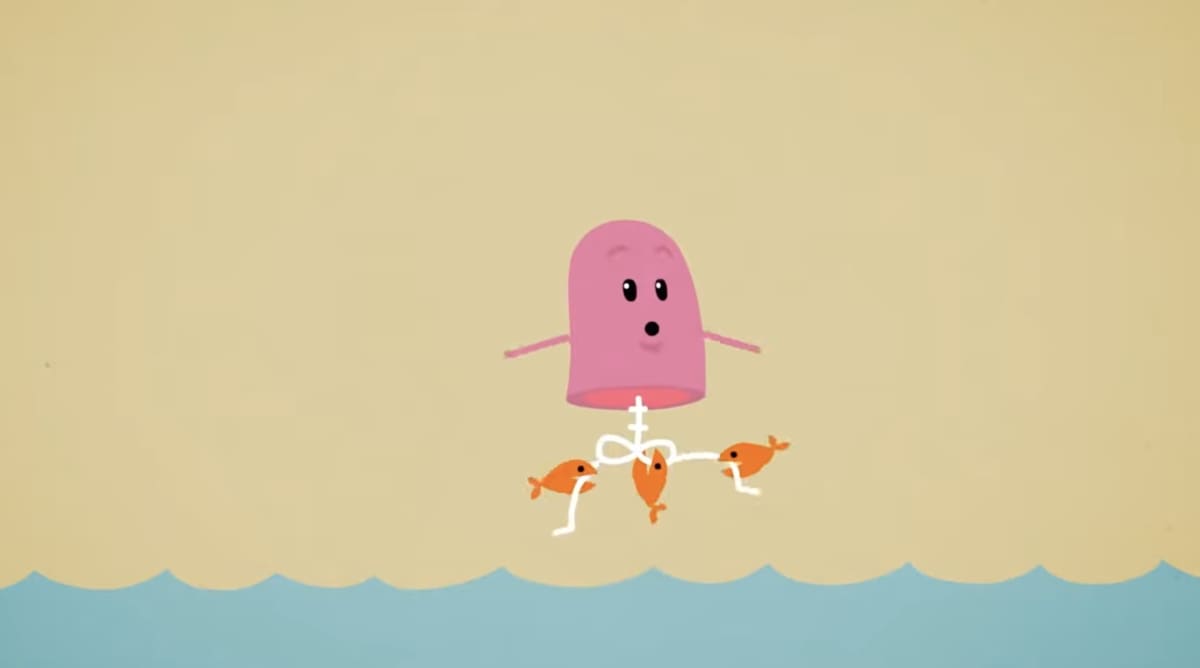 Still from the “Dumb Ways to Die” video showing a bean character using itself as piranha bait, the absurdly specific image from the opening verse.