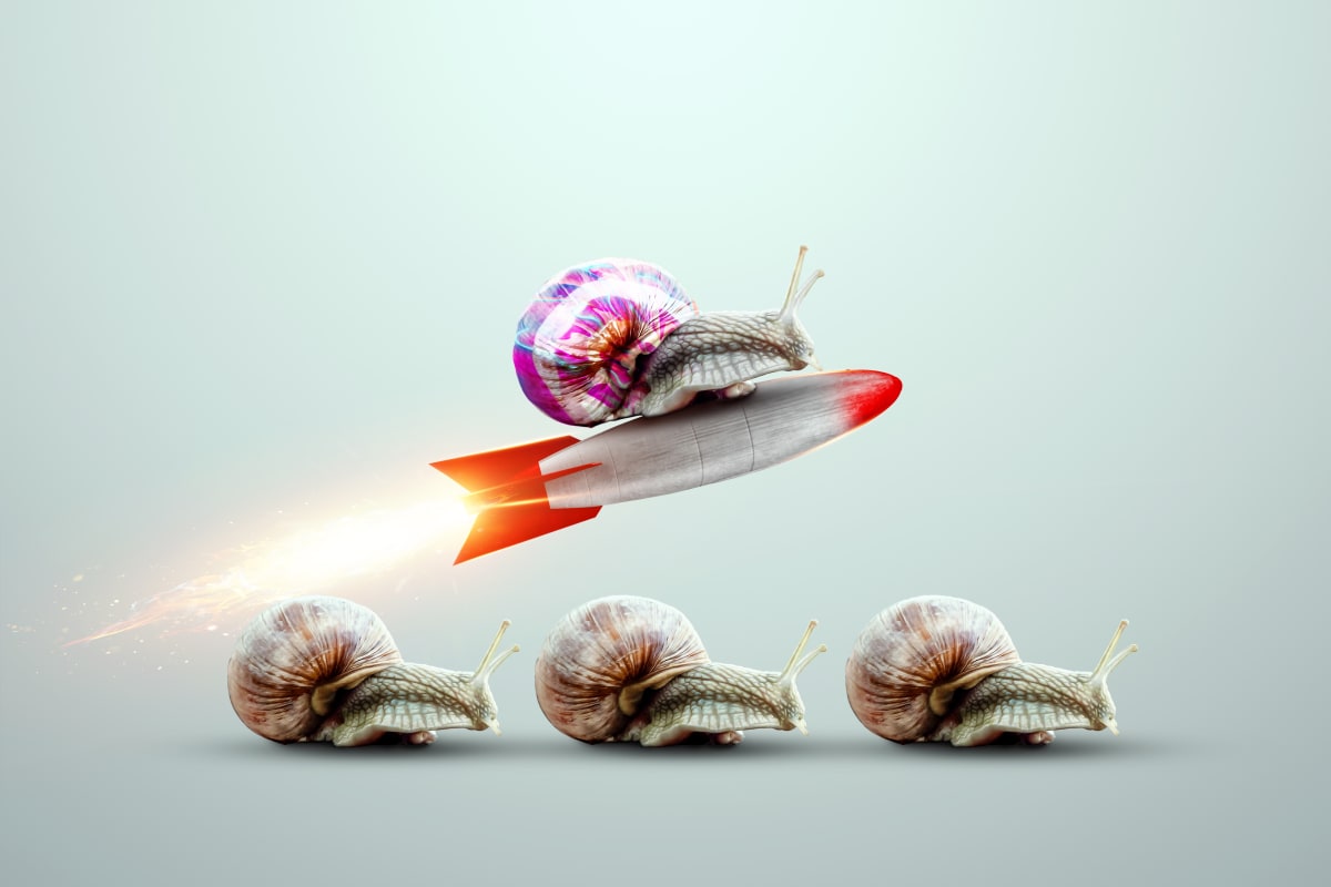 A snail on a rocket surpasses other snails.