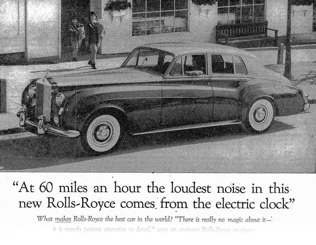 A scan of an advert showing a photo of a Rolls Royce with the headline: At 60 miles an hour the loudest noise in this new Rolls-Royce comes from the electric clock.