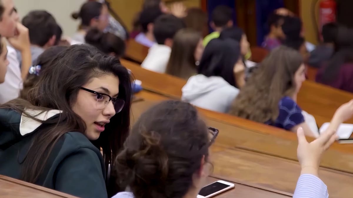 Some of Reach Cambridge’s students in a lecture hall.