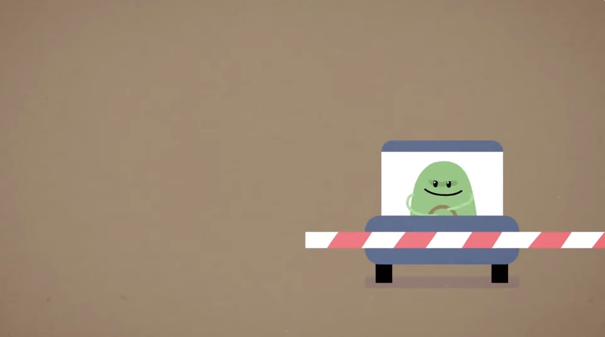 Still from the “Dumb Ways to Die” video showing one of the bean characters standing on the edge of a train platform during the closing safety verse.