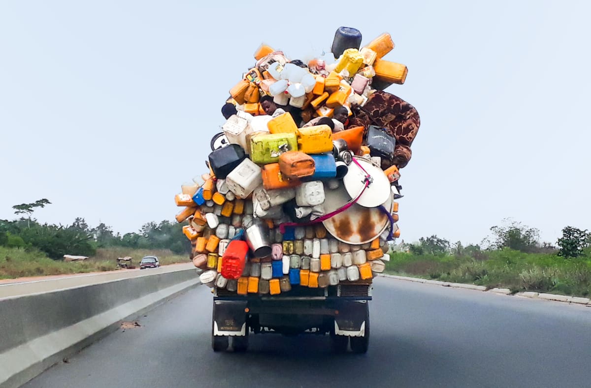 A truck piled high with goods.