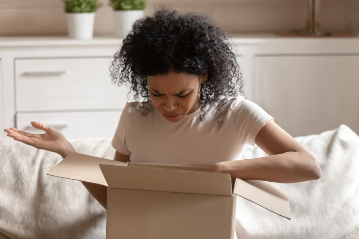 A woman is confused by what’s been delivered.