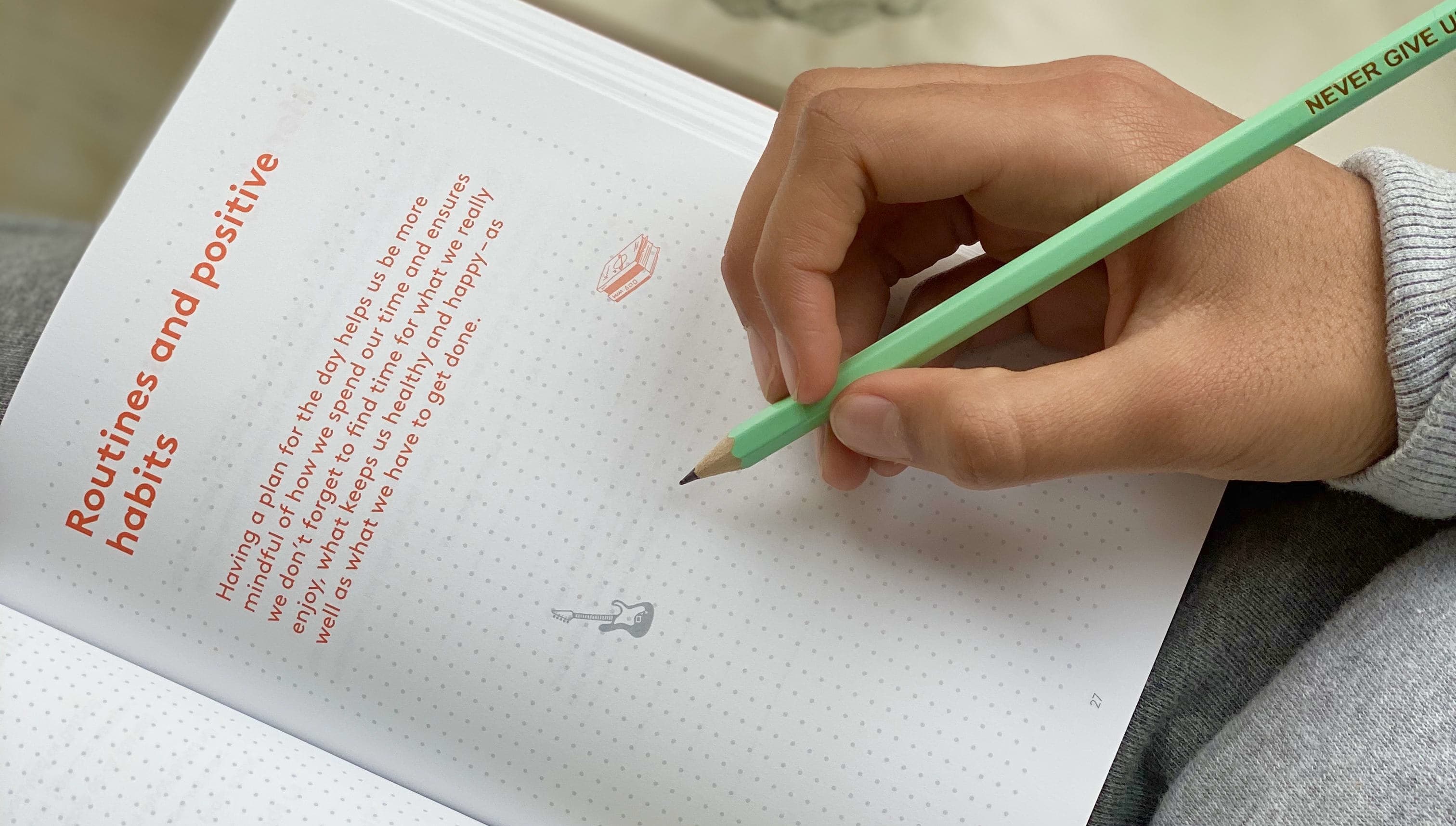 A close up photo of The HappySelf Journal