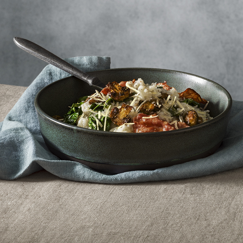 Krämig risotto med champinjoner, spenat och rökt skinka