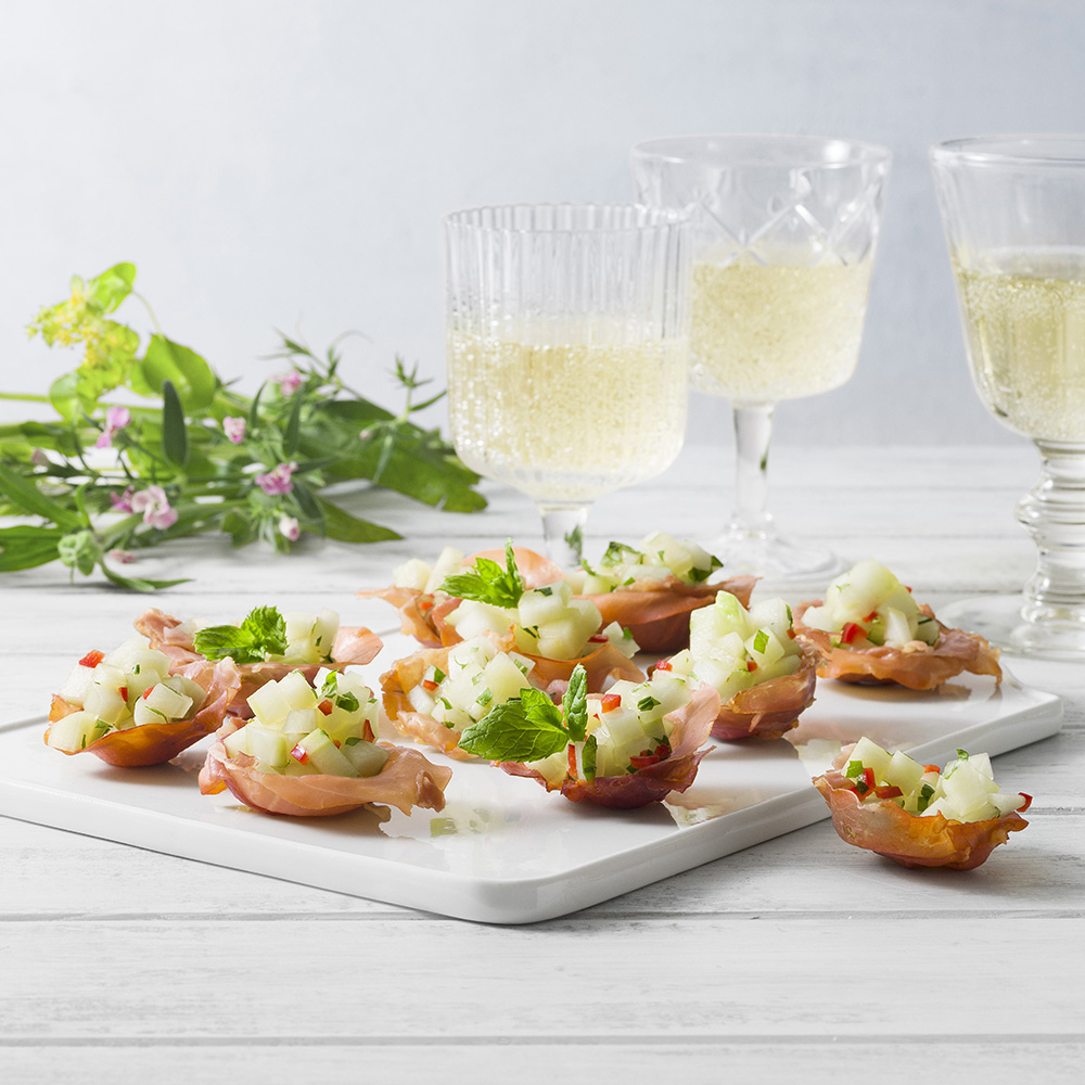 Parmakorgar med melonsallad