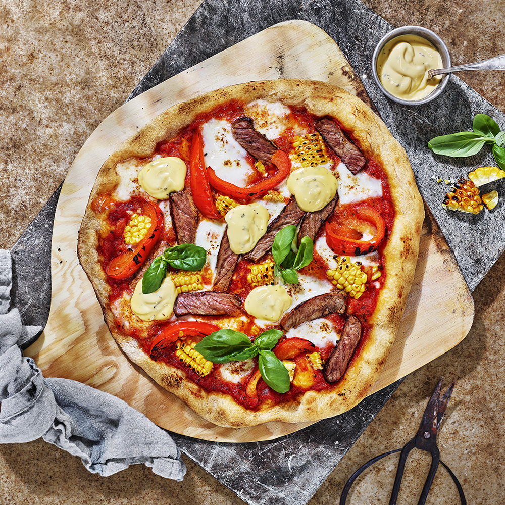 Pizza på grillens rester