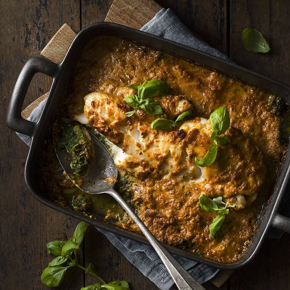 Fisk i ugn med spenat och soltorkade tomater