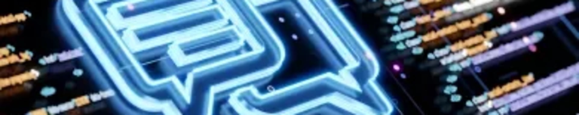 Programmiercode auf einem Screen mit zwei Sprechblasen darüber