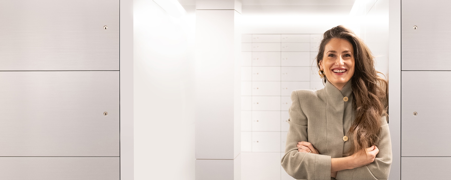 More information about cosmofunding: A woman is standing in a bright aisle.