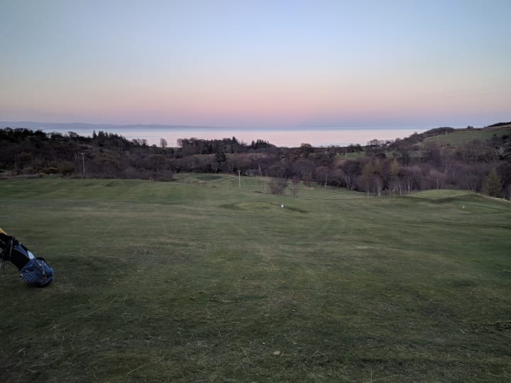 corrie golf course pink sky at night